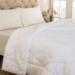 Why are white sheets used in hotels?