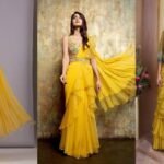 शादी के फंक्शन में पहनें के लिए बेस्ट है ये Yellow Lehenga Saree, देखें डिजाइन